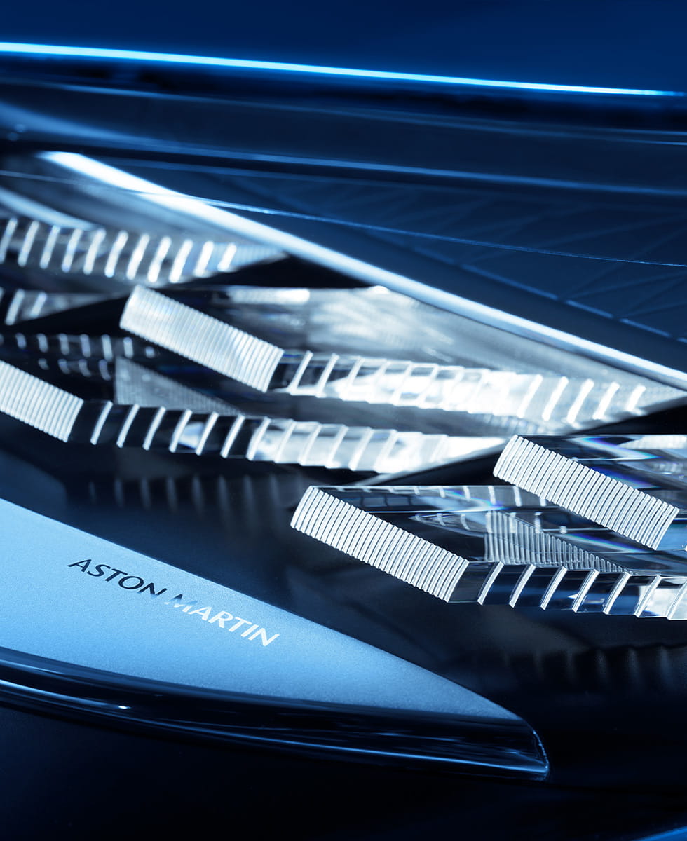 An extreme close up of detailed headlights on DB12 S