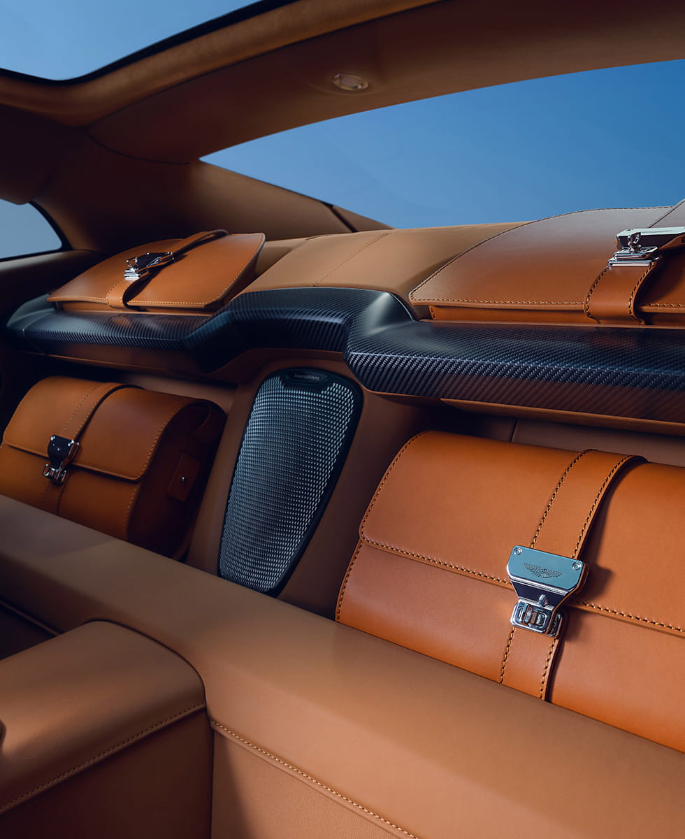 Luggage area - four satchels displayed in Aston Martin Vanquish
